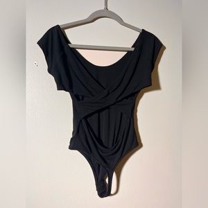 Black bodysuit with story super cute open back